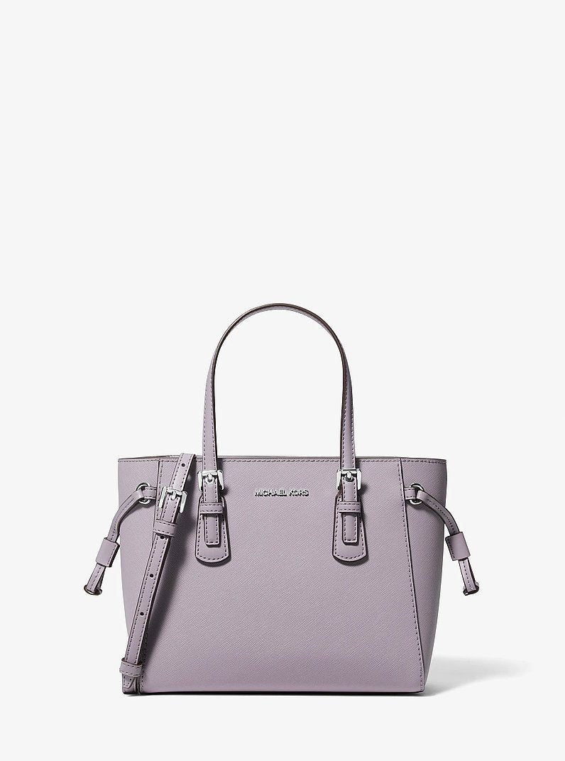 Michael Kors Voyager Extra-Small Pebbled Leather Convertible Crossbody Bag en Lilac — vista frontal | Original Export