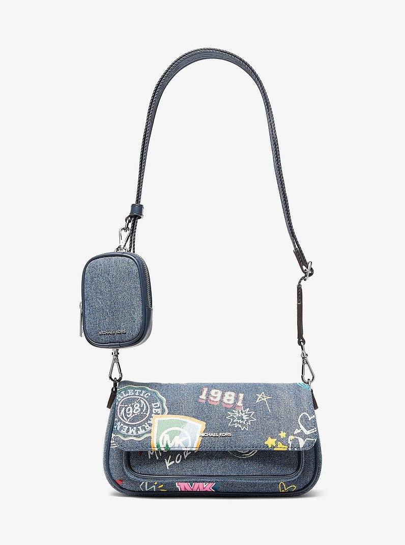 Michael Kors Jet Set Travel Small Embellished Denim Crossbody Bag With Pouch en Washed Denim — vista frontal | Original Export