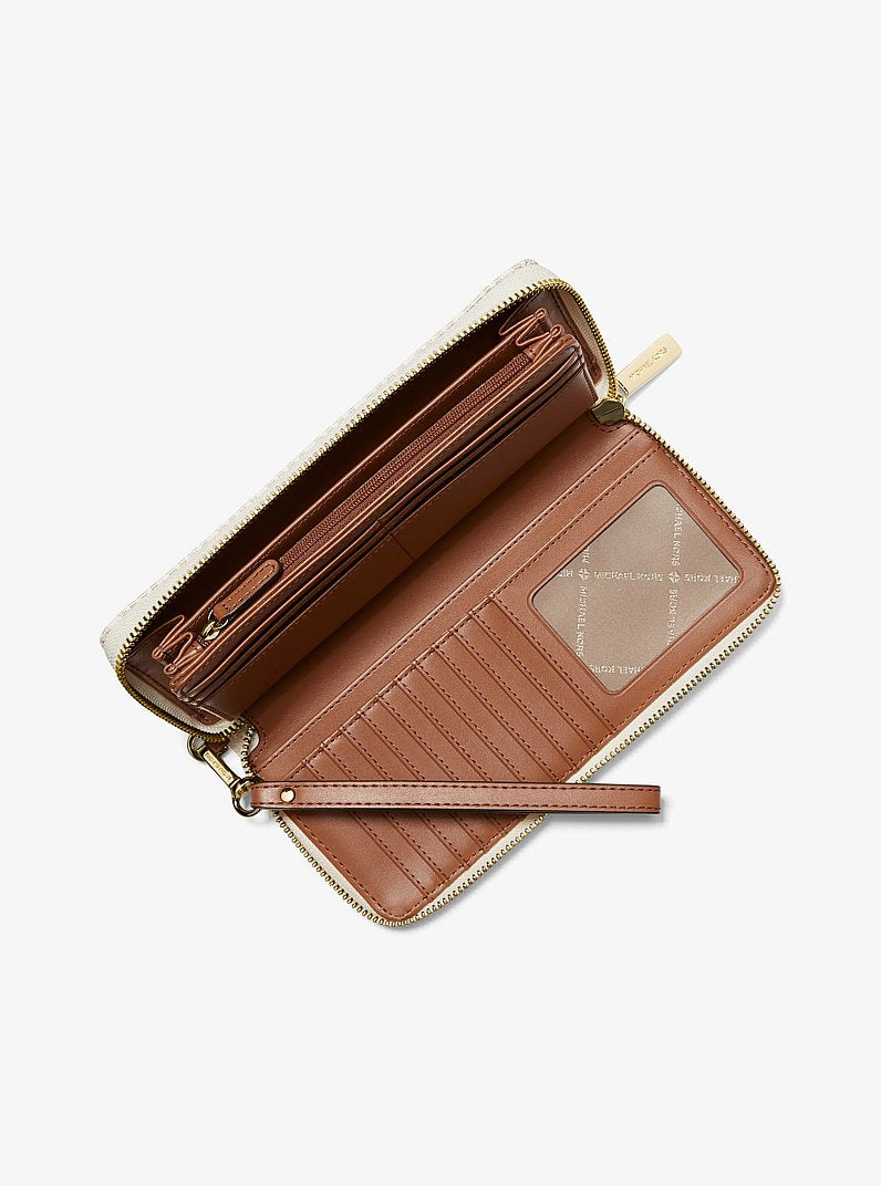 Carteira de Pulso Michael Kors Jet Set Travel Large Logo Continental Wristlet, Lona com Logo Signature, cor Vanilla (Bege Claro), vista lateral | Original Exports