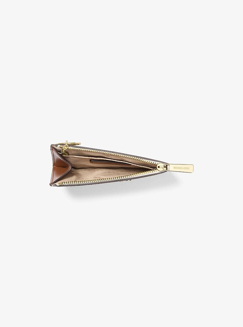 Porta-moedas Michael Kors Jet Set Travel Small Signature Logo Coin Purse, Lona com Logo Signature, cor Vanilla (Bege Claro), vista lateral | Original Exports