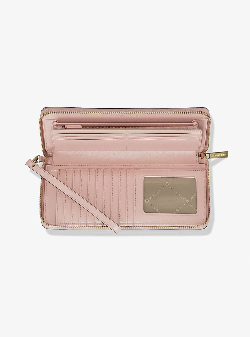 Carteira de Pulso Michael Kors Jet Set Travel Large Signature Logo Continental Wristlet, Lona com Logo Signature, cor Powder Blush (Rosa Empoeirado), vista lateral | Original Exports