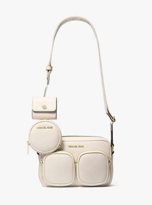 Michael Kors Jet Set Travel Medium Leather Messenger Bag en Lt Cream — vista frontal | Original Export