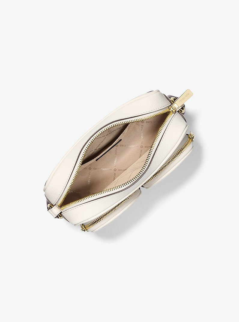 Michael Kors Jet Set Travel Medium Leather Messenger Bag en Lt Cream — vista lateral | Original Export