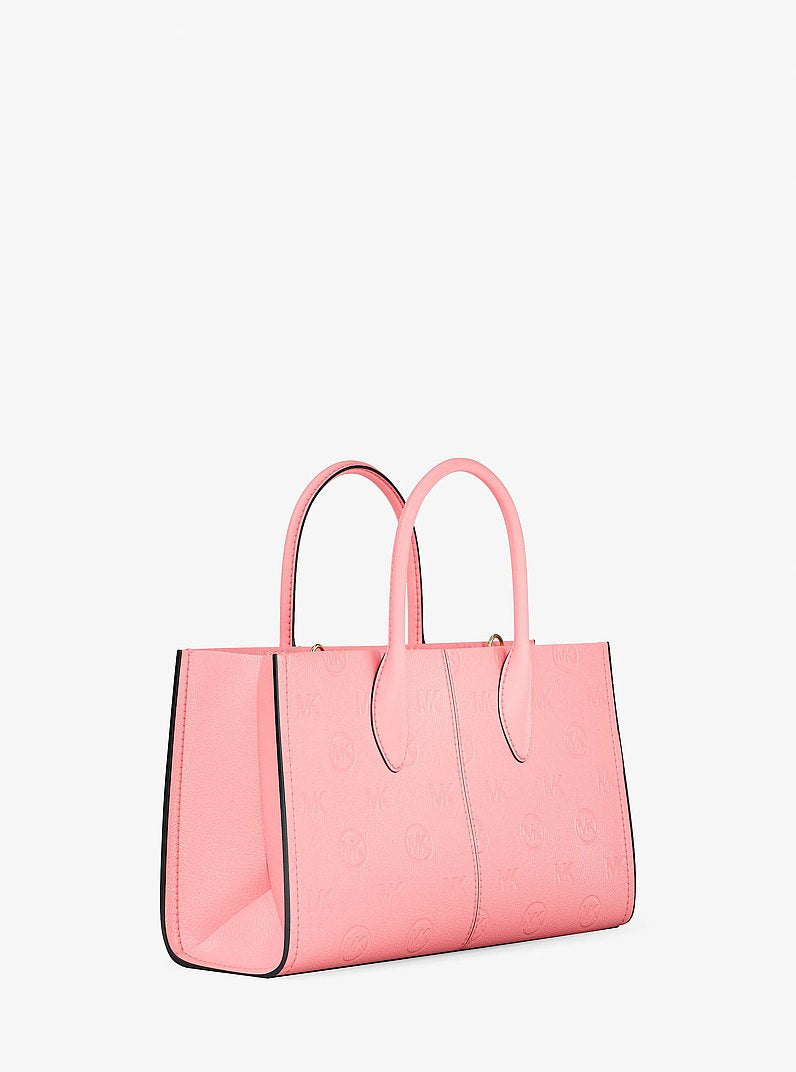 Bolsa Michael Kors Mirella Medium Logo Debossed Satchel, Couro Vegano, cor Carnation (Rosa Cravo), detalhe do material | Original Exports