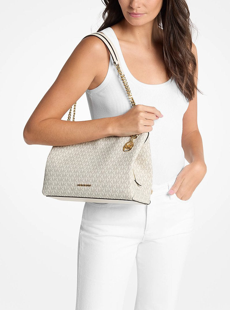 Bolsa Michael Kors Christina Medium Signature Logo Messenger Bag, Lona com Logo Signature, cor Creme Claro Multicolor, detalhe do material | Original Exports