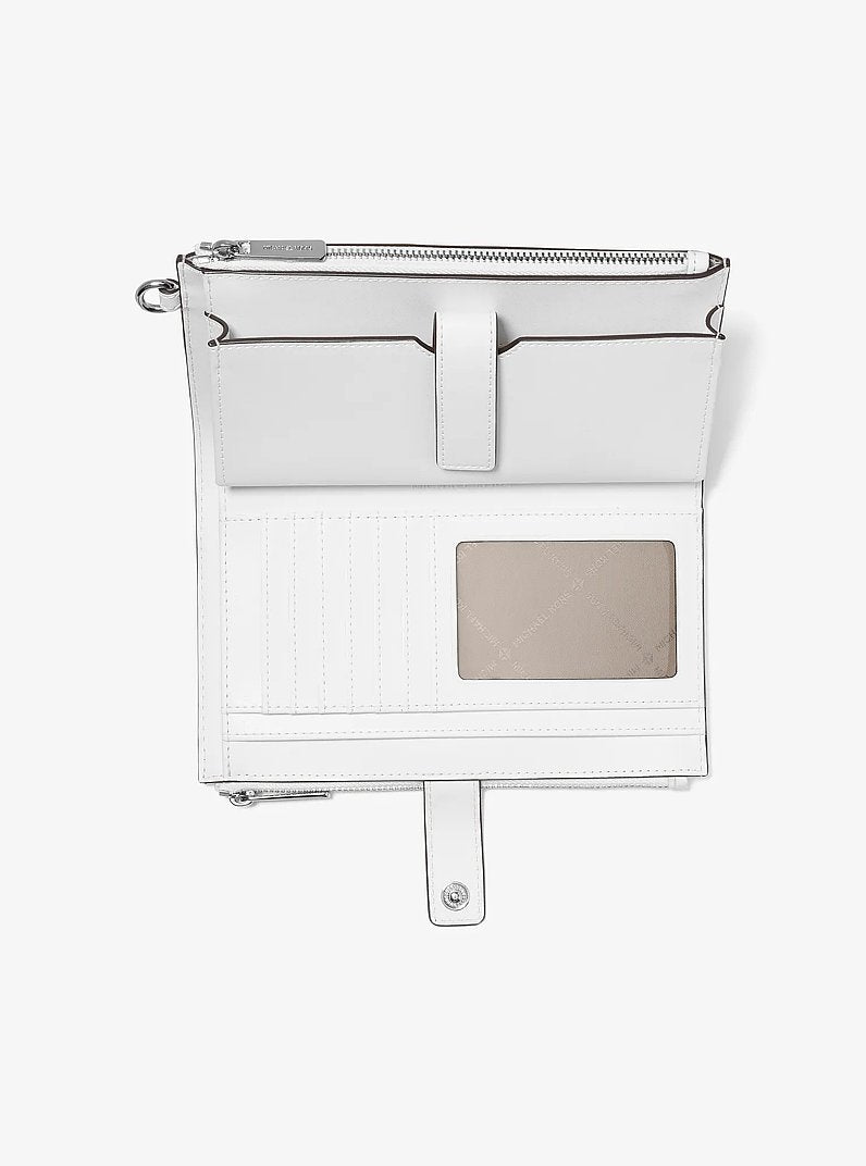 Carteira de Pulso Michael Kors Jet Set Travel Rainbow Logo Embossed Wristlet, Logo em Relevo, cor Branco Óptico, vista lateral | Original Exports