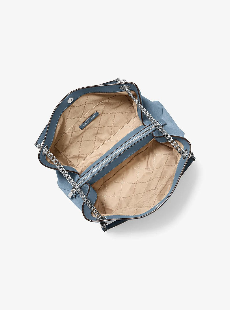Michael Kors Christina Medium Suede Messenger Bag en Denim — vista lateral | Original Export