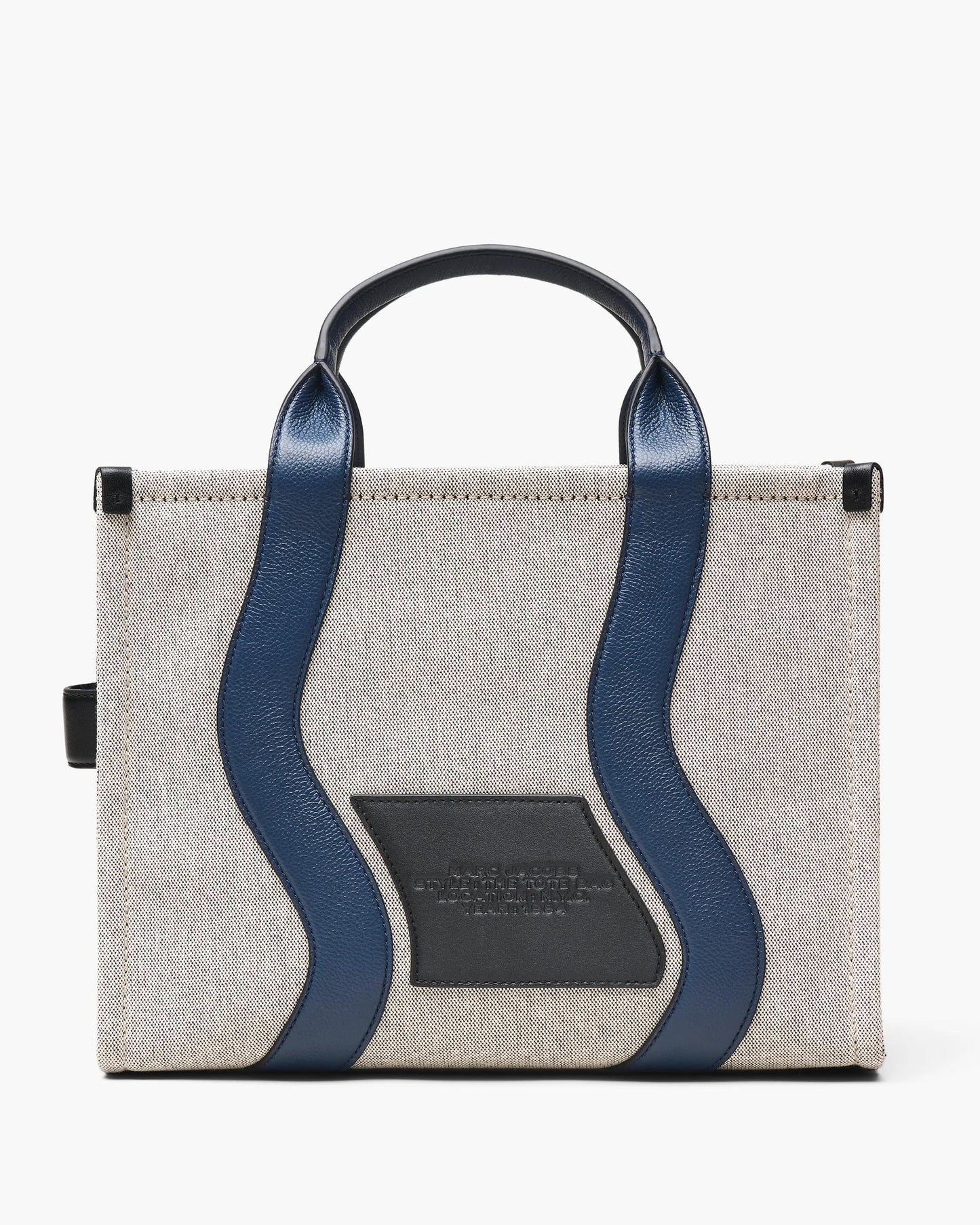 Bolsa Marc Jacobs The Wavy Canvas Medium Tote Bag, Lona de Algodão com acabamento em couro, cor Marfim/Azul Marinho, detalhe do material | Original Exports